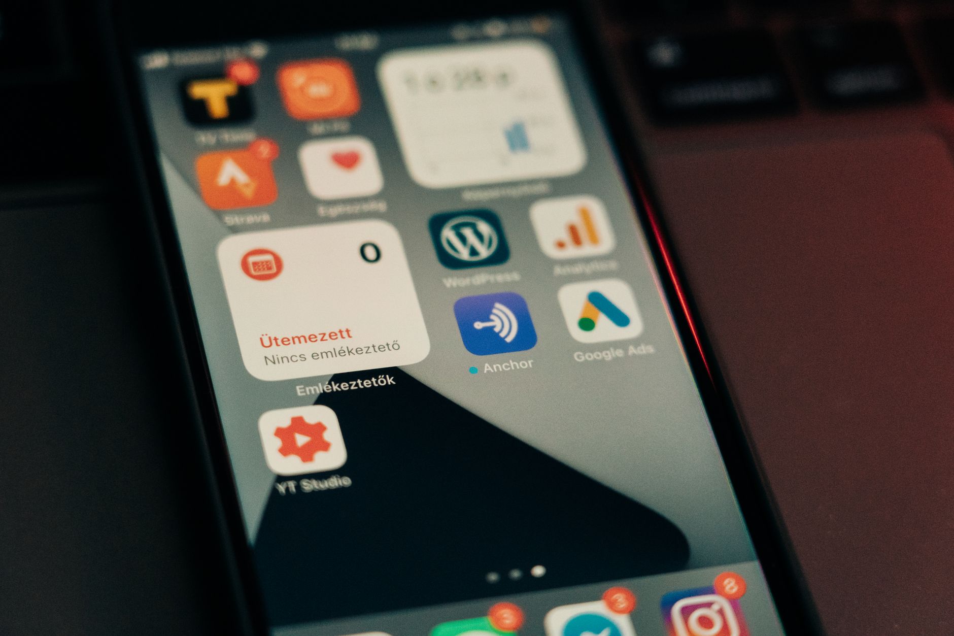 A clean flat mock of an ad account or bank deposit notification on a mobile screen, screen is the sole subject, no human in frame, real notification UI visible, captured with imperfect phone photography angle.